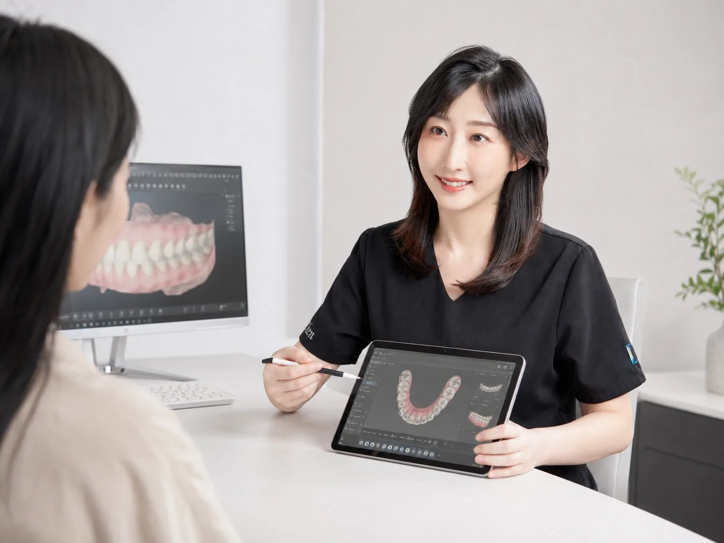 D4 clinician explaining a digital adult orthodontic treatment plan.